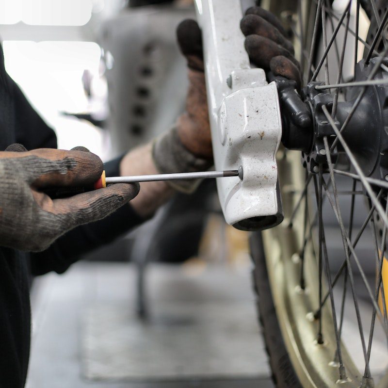 repairing e-bike in workshop